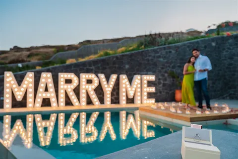 Santorini marry me pool reflection