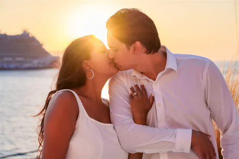 Santorini proposal golden hour kiss