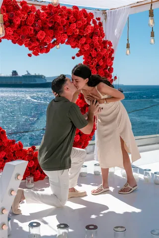 Santorini red rose heart proposal kiss